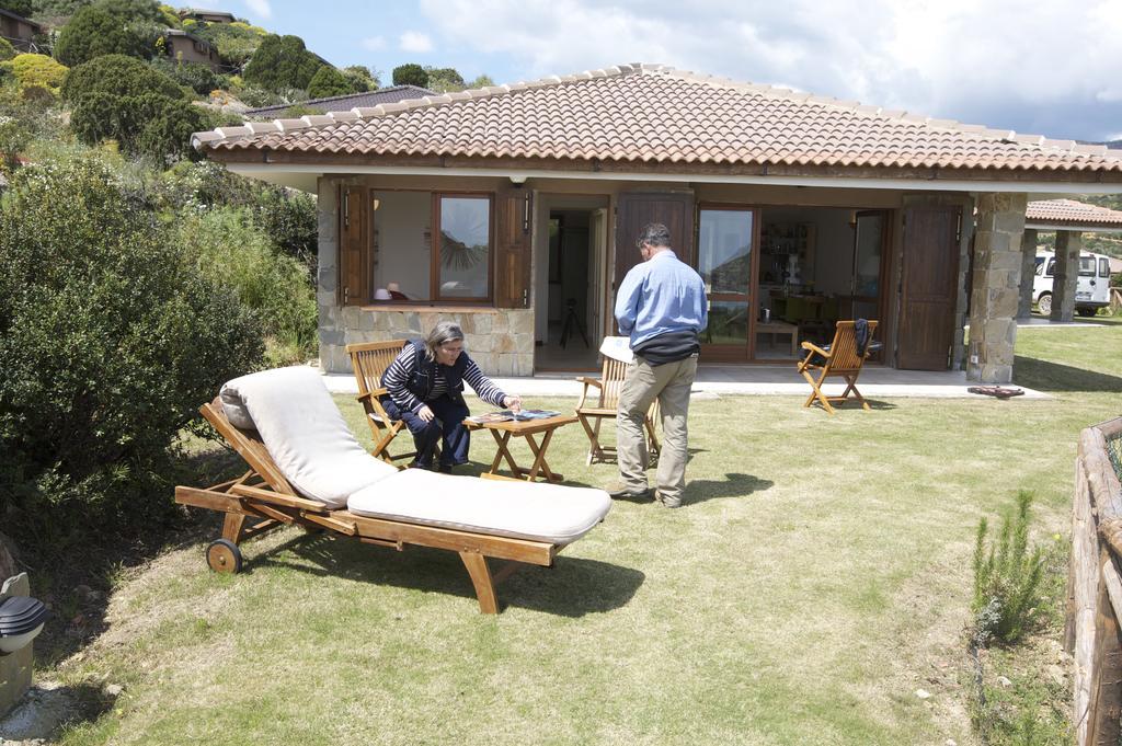 Case Sul Mare Residenze Di Bes Chia Esterno foto